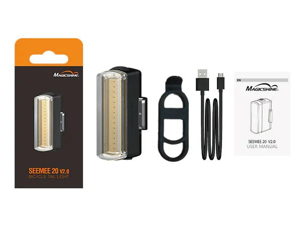 Magicshine SEEMEE 20 V2.0 rear bicycle light with packaging, light, USB cable, and user manual on a white background.
