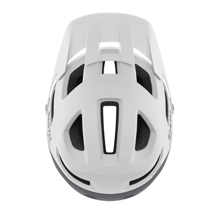 A bird's eye view of a white Smith mountain bike helmet against a white background