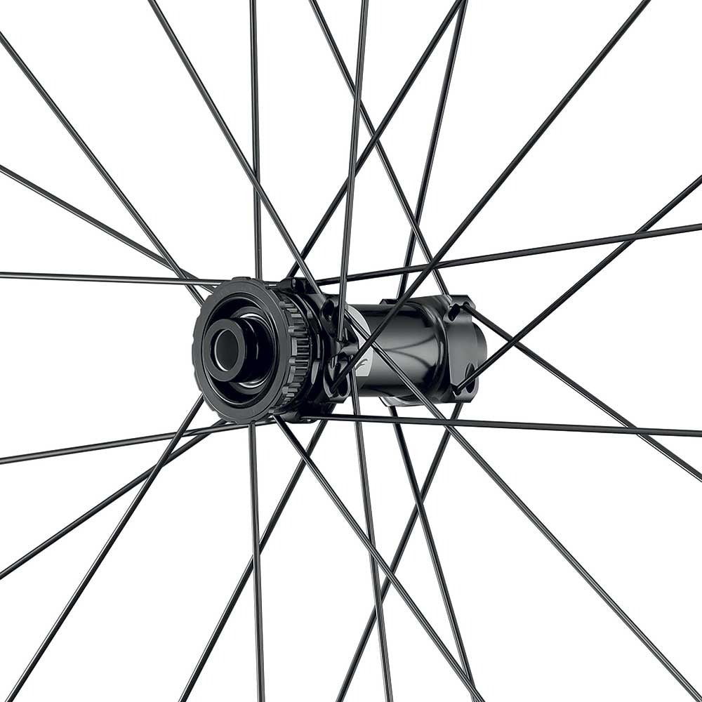 Close-up of a front road bike wheel wheel with black spokes on a white background