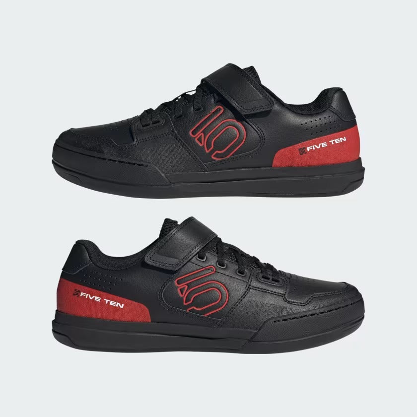 Black and red mountain bike shoes with 'Five Ten' logo on a white background
