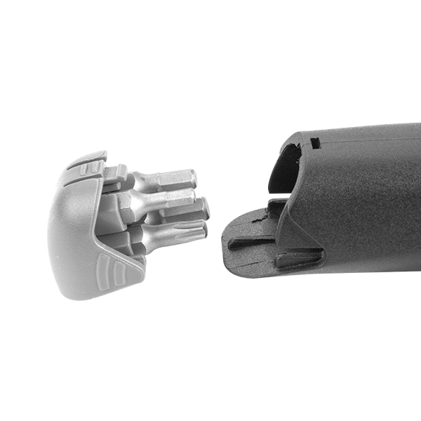 Torque Wrench bits showing their storage space in the handle of the tool on a white background