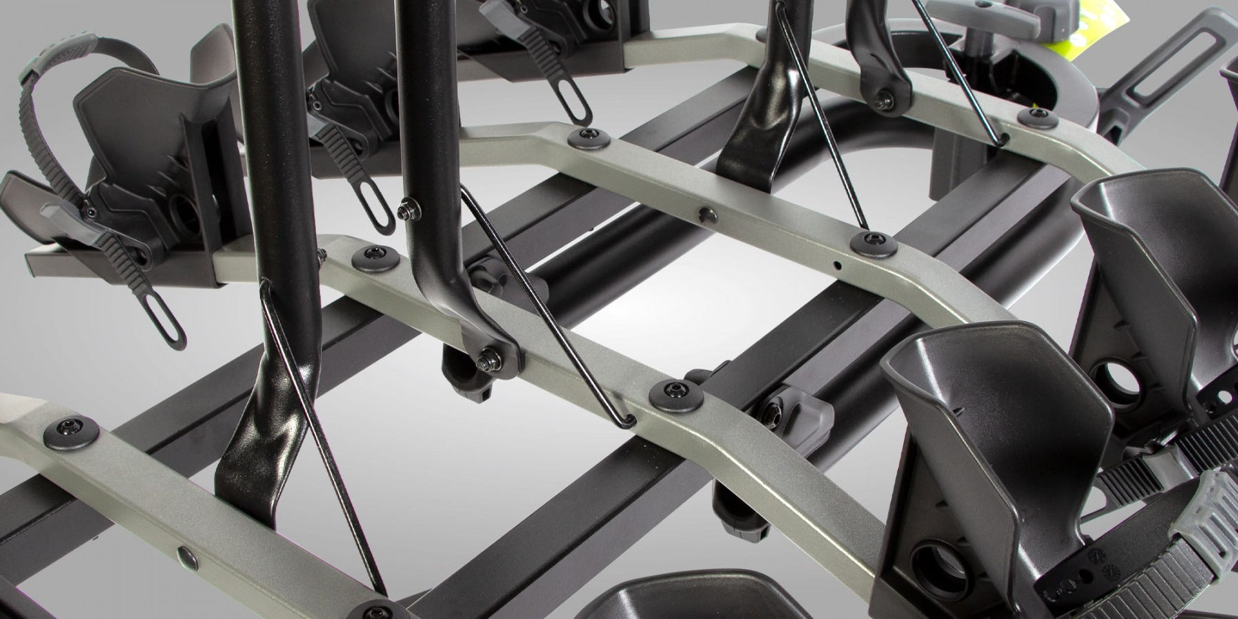 Close up of a bicycle rack on a gray background