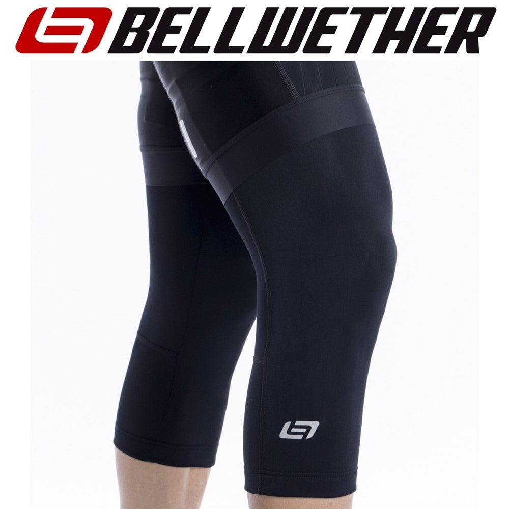 Black cycling shorts and knee warmers with Bellwether logo on a white background