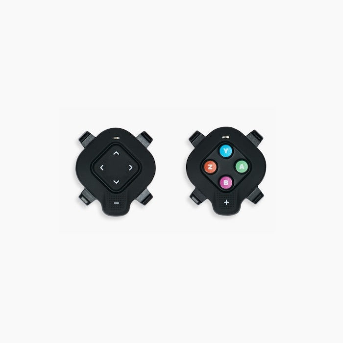 Two black electronic components for the Wahoo Smart Kickr Core 2 Indoor Bike Trainer on a white background