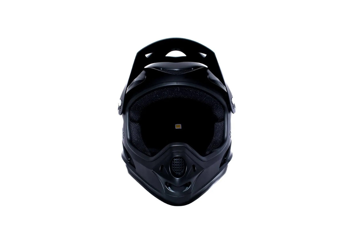 Front view of a black full face mountain bike helmet on a white background