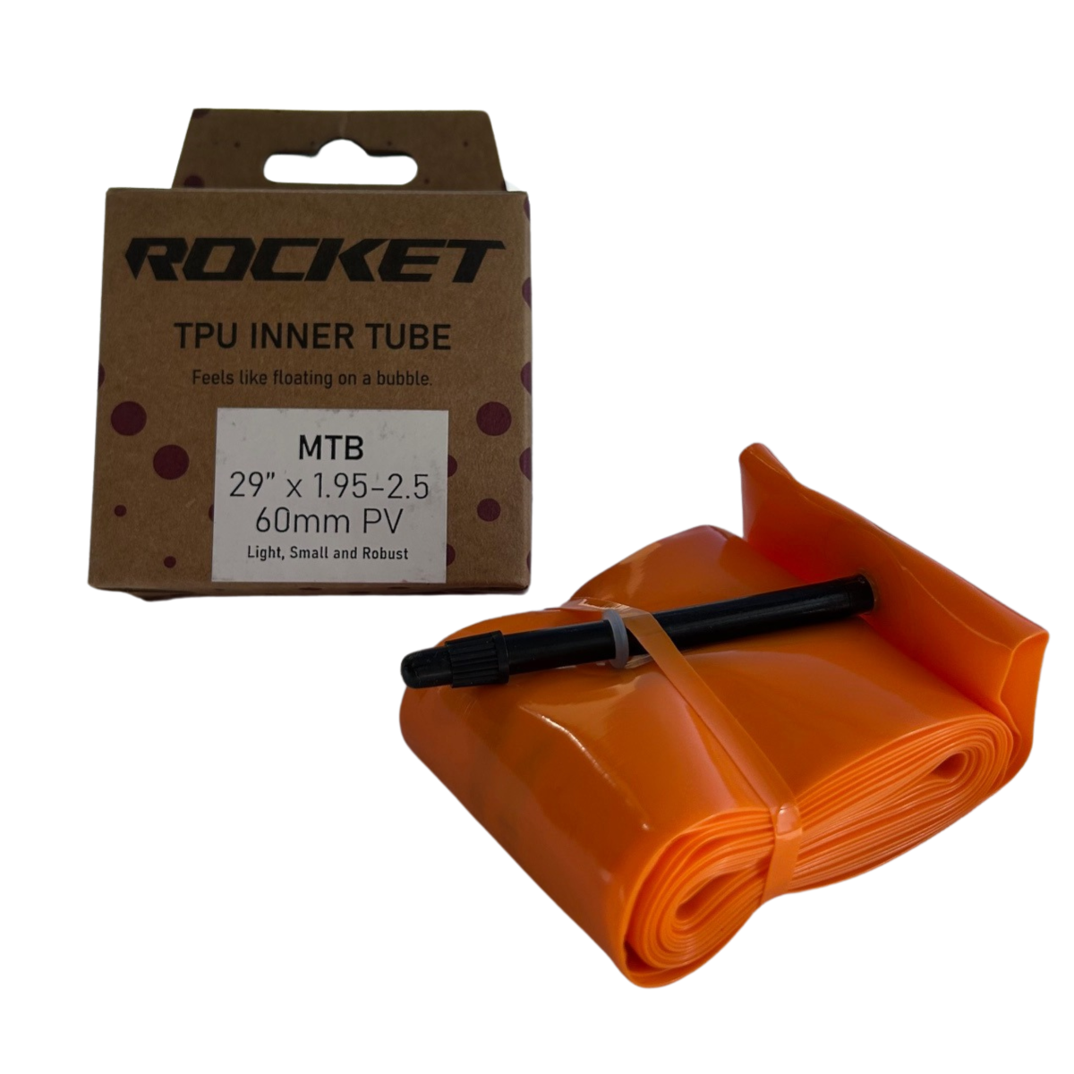 Orange bicycle inner TPU tube with black valve and Rocket branded packaging on a white background