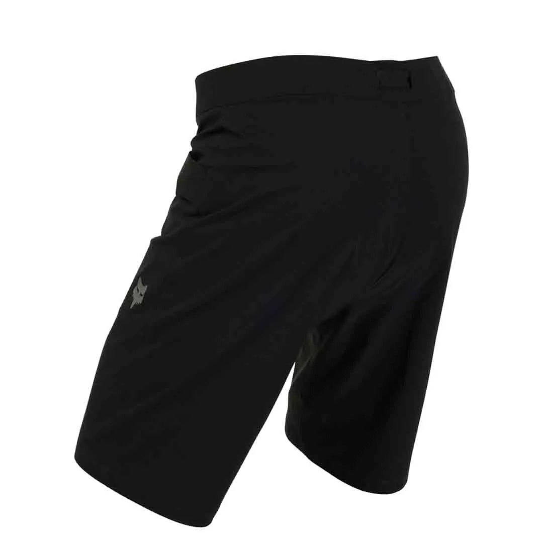 A back view of a pair of black mountain bike shorts on a white background