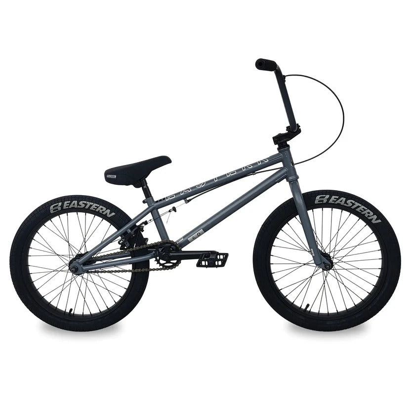 Gray BMX bike with black tyres on a white background
