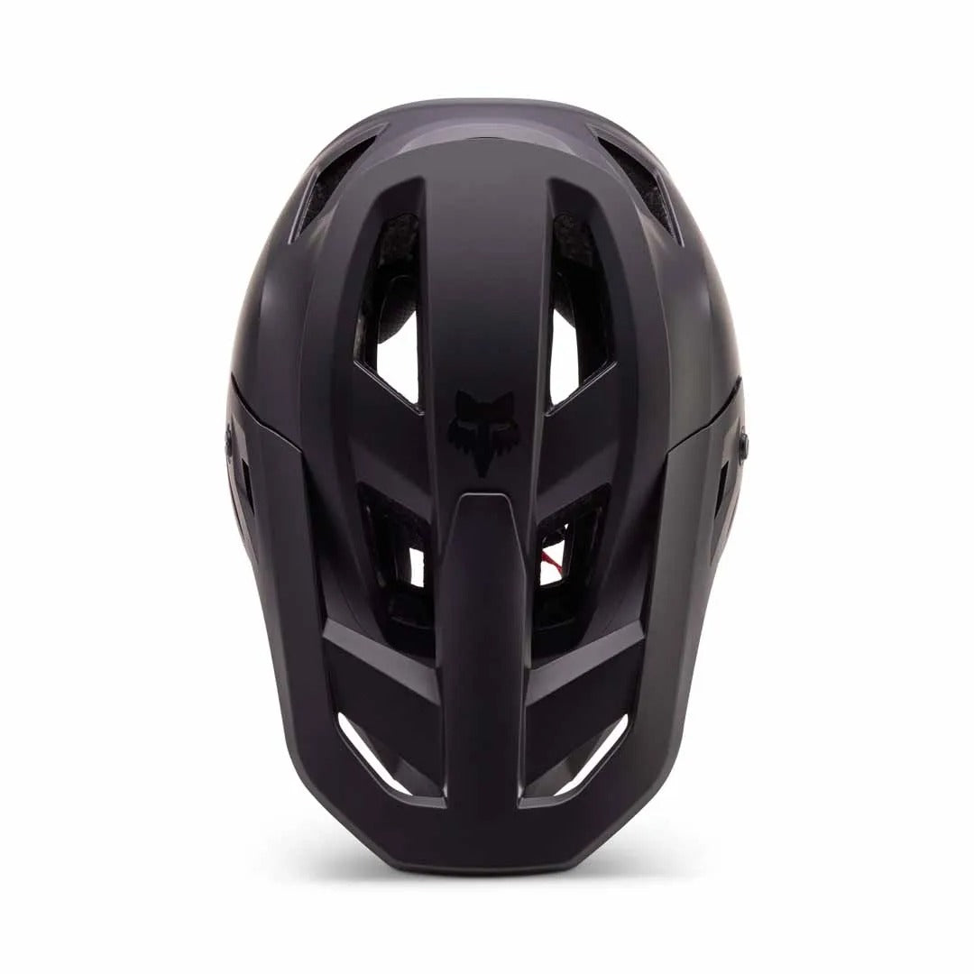 Top of a blackfull face mountain bike helmet on a white background