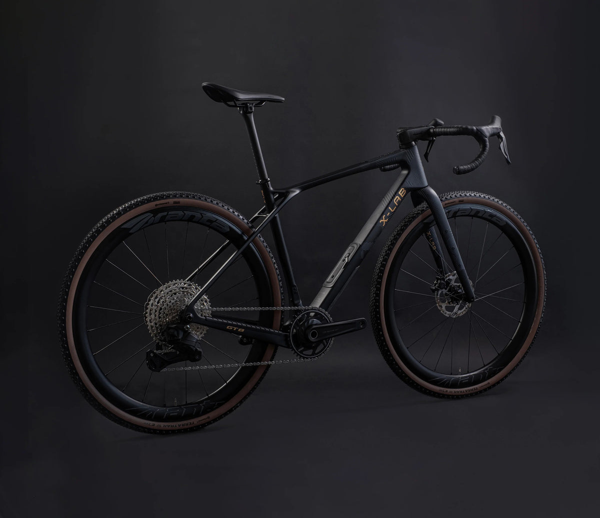 Black X-LAB Gravel Bike on a dark background