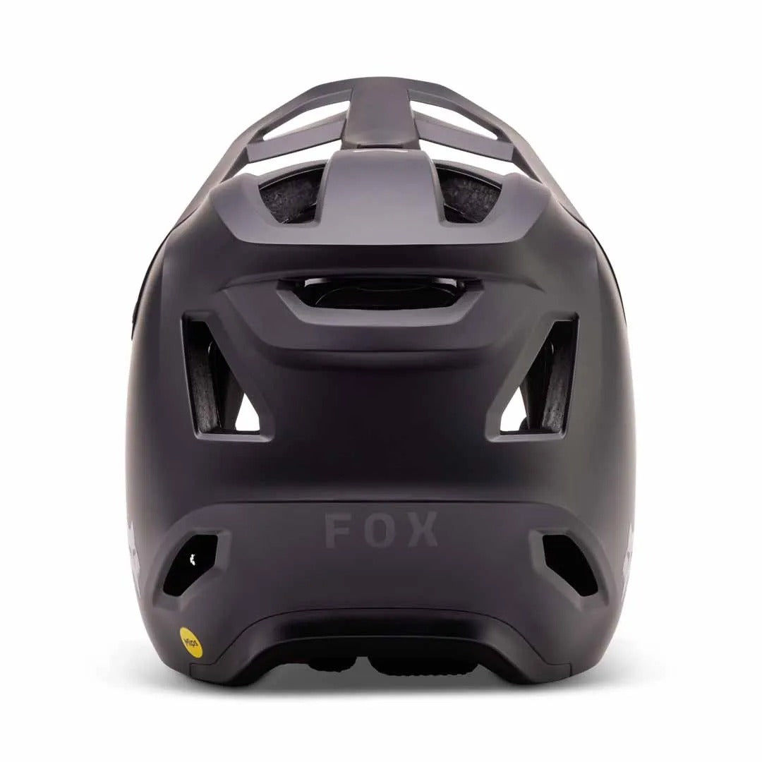 Black full face mountain bike helmet with 'FOX' branding on a white background