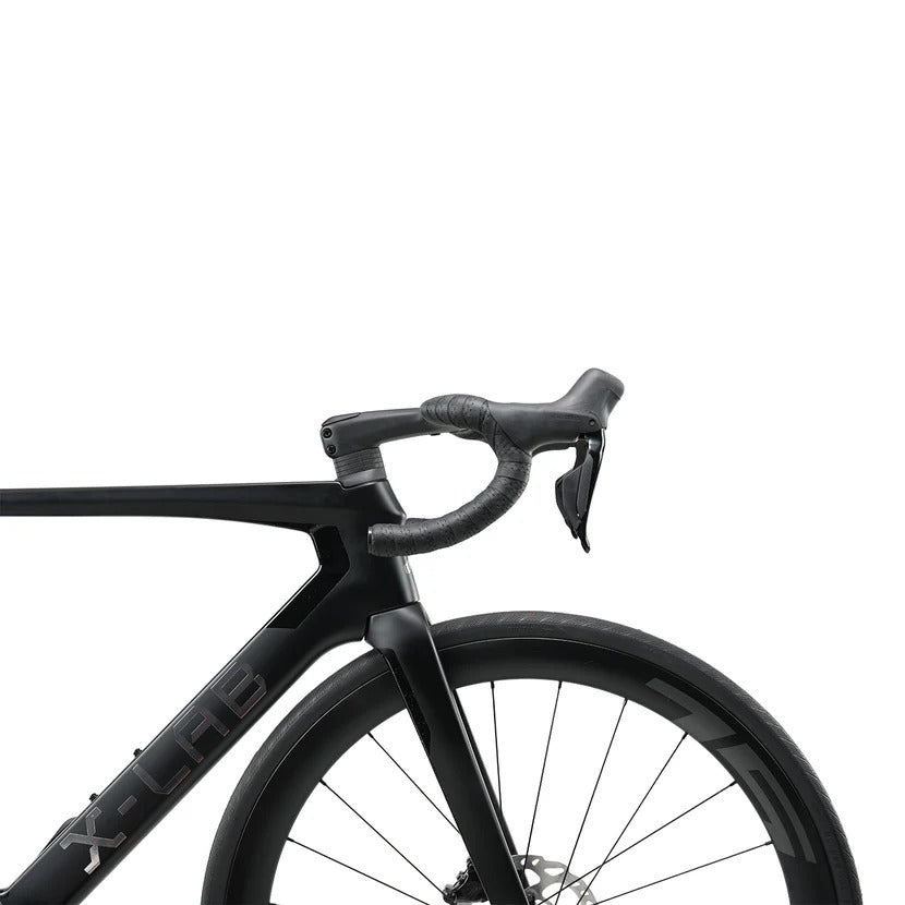 Black X-Lab road bike on a white background