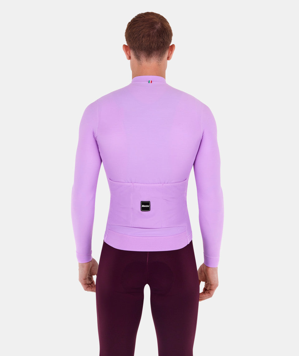 A picture of a bloke from behind wearing the lilac Santini Long Sleeve Unisex Winter Fleece Jersey