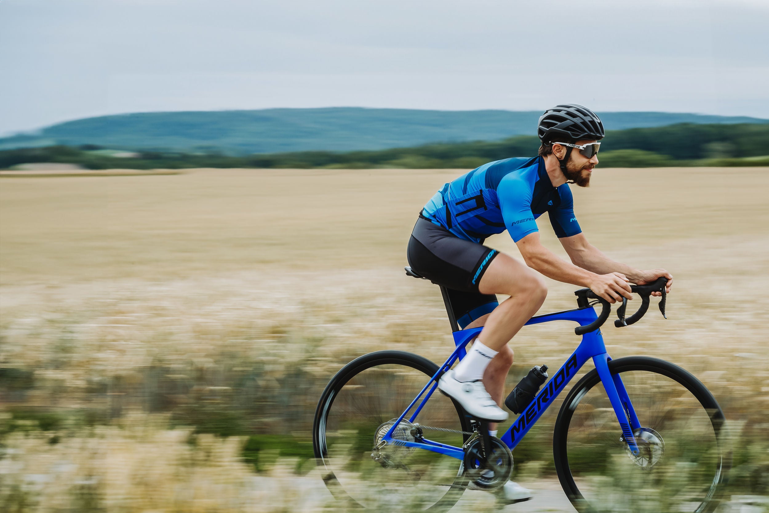 A cyclist riding a Merida Road Bike