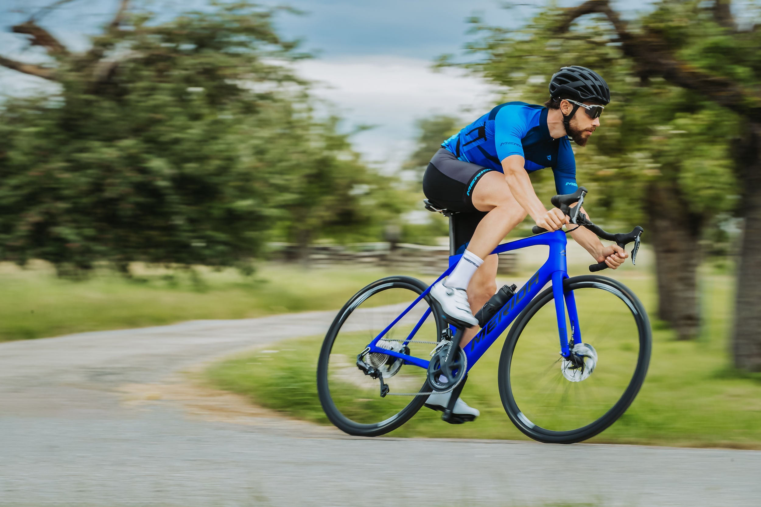 A cyclist riding a Merida Road Bike