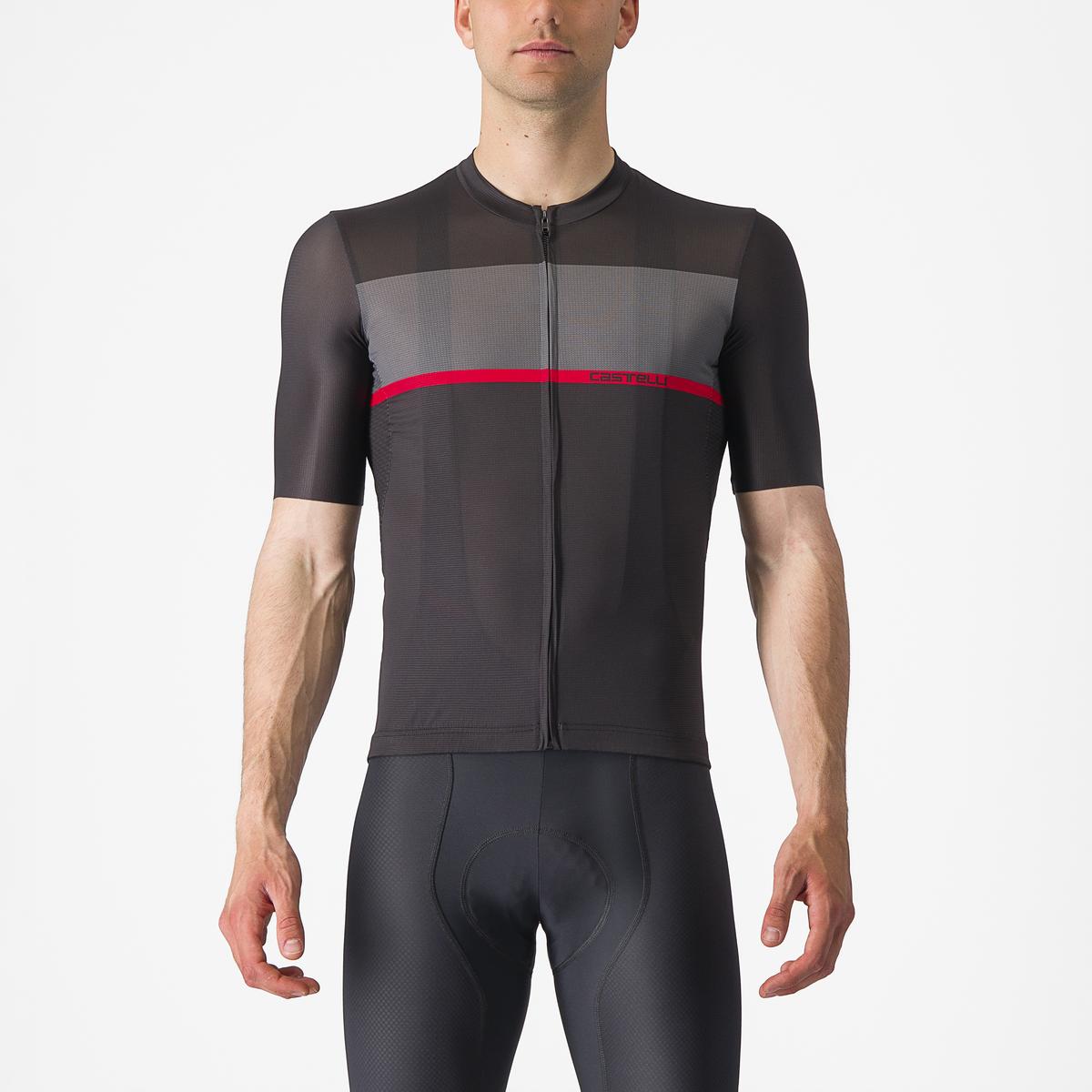 Person wearing a black and gray cycling jersey with a red stripe on a white background