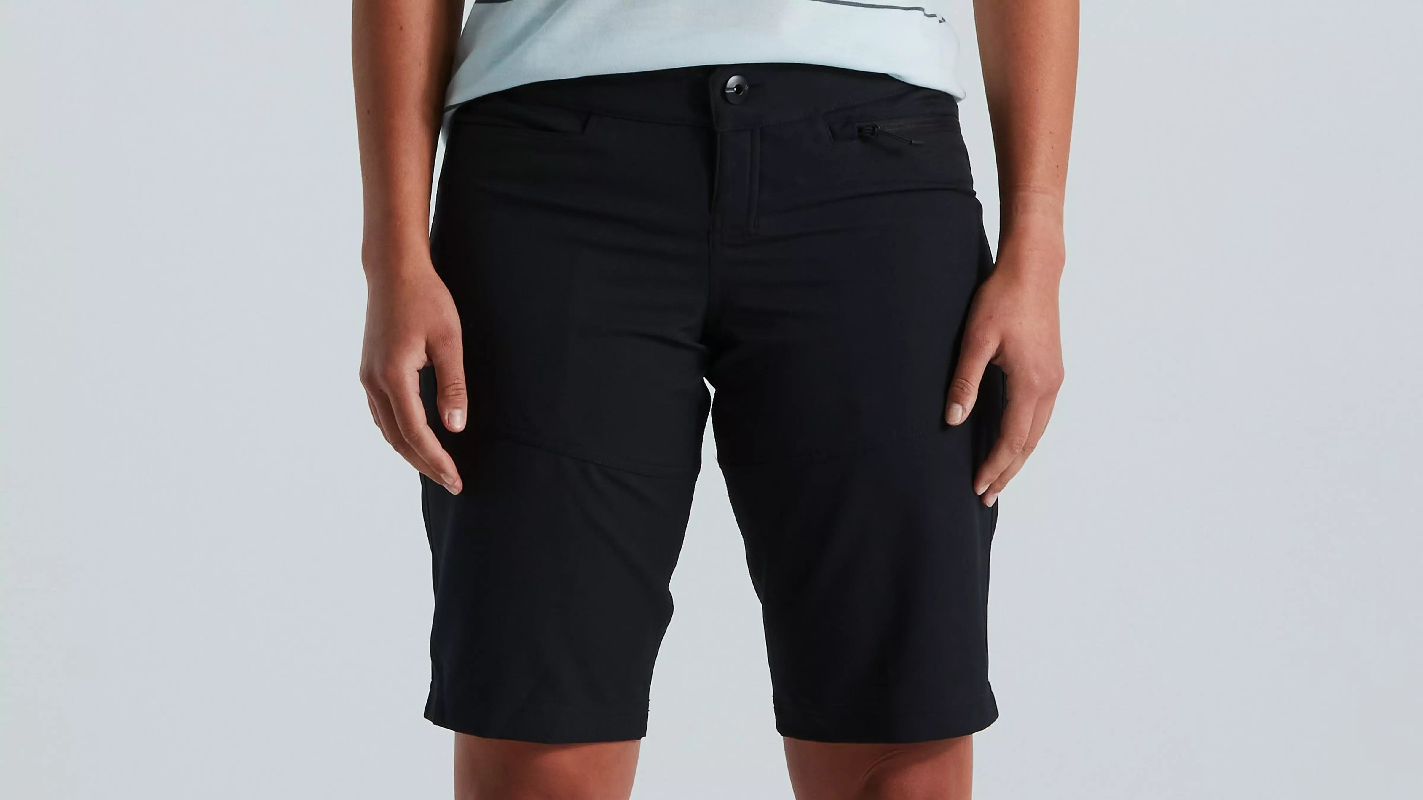 A picture of a lady wearing mountain bike shorts