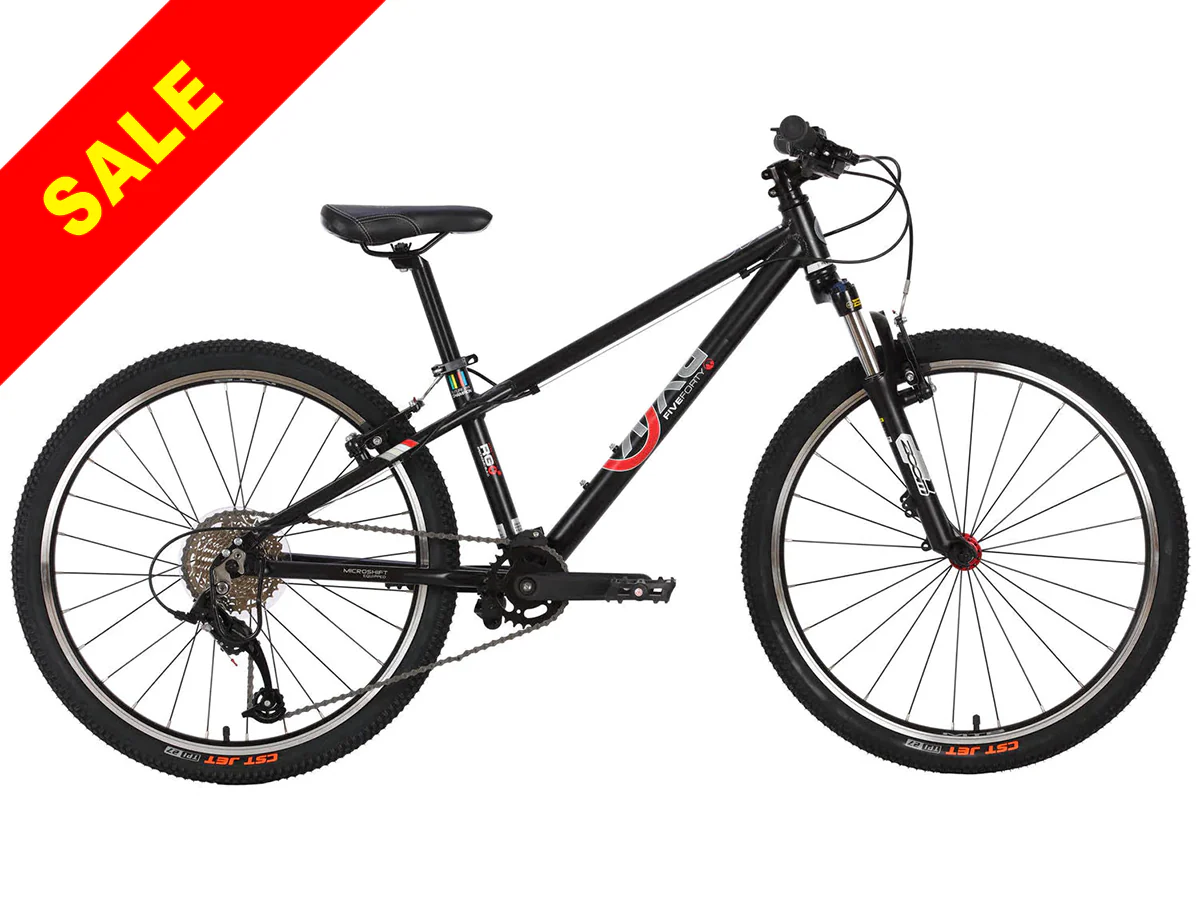 Black and red kids mountain bike with a red sale banner on a white background