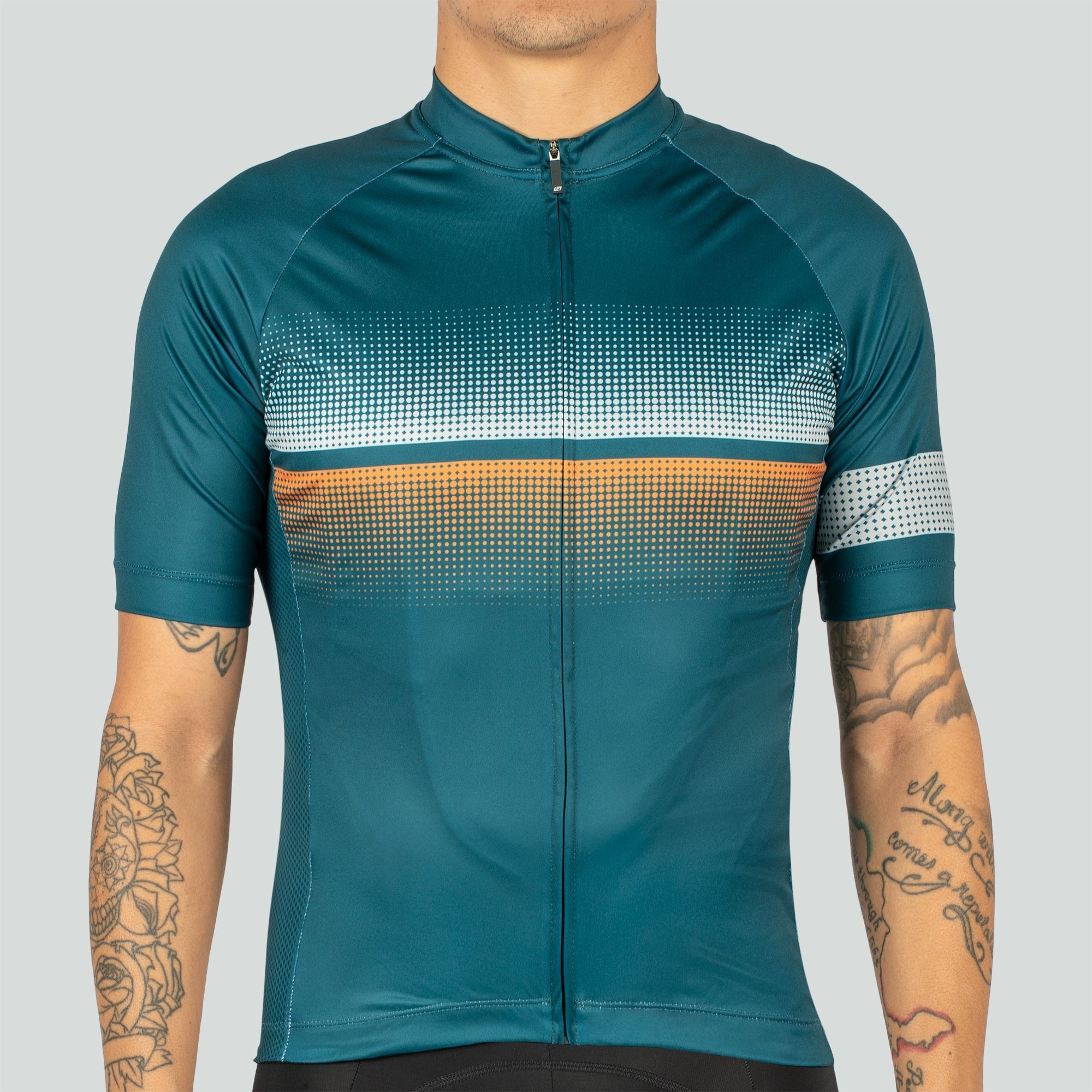 A picture of a man wearing a Bellwether Pinnacle Cycling Jersey