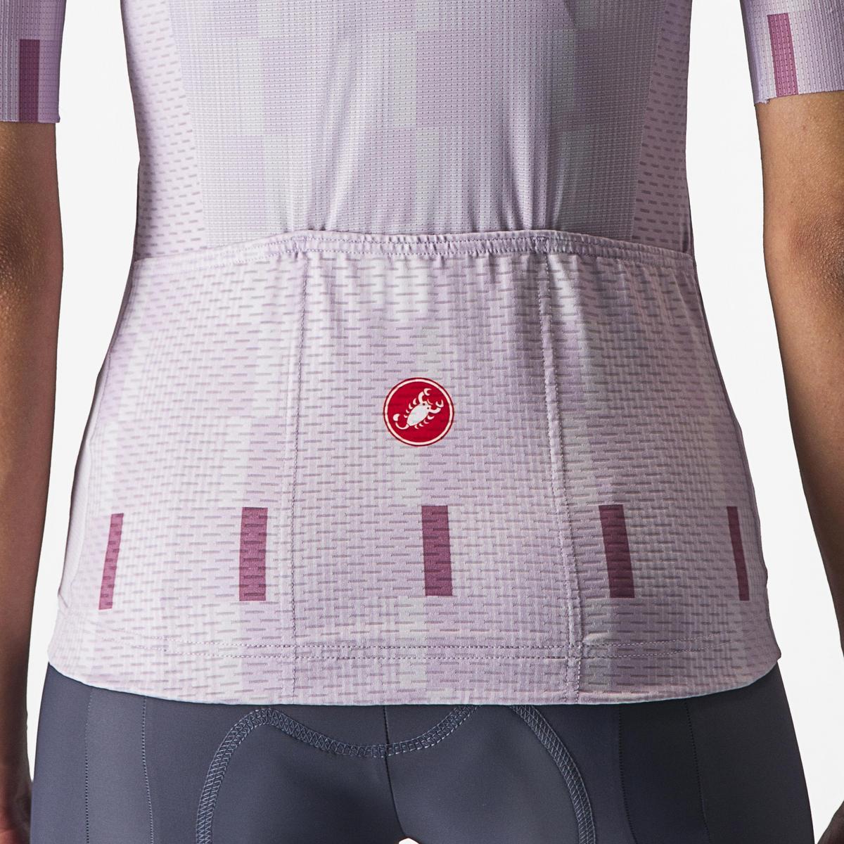 Close-up of the back pocket of a light purple cycling jersey with a brand logo on a white background