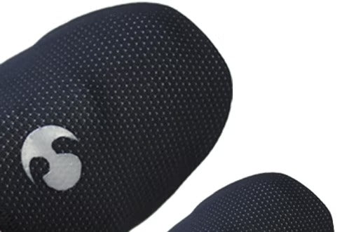 Black textured cycling shoe toe covers on a white background