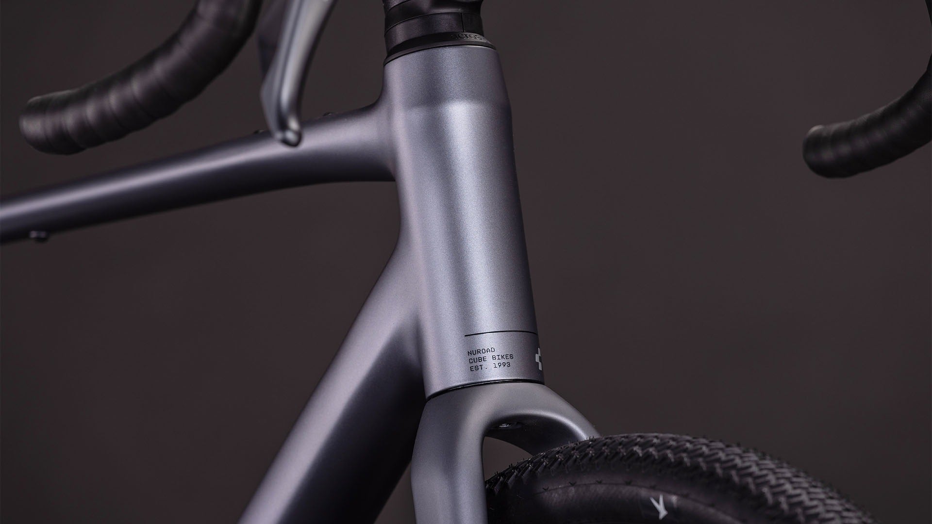 Close-up of a bicycle frame with a dark background