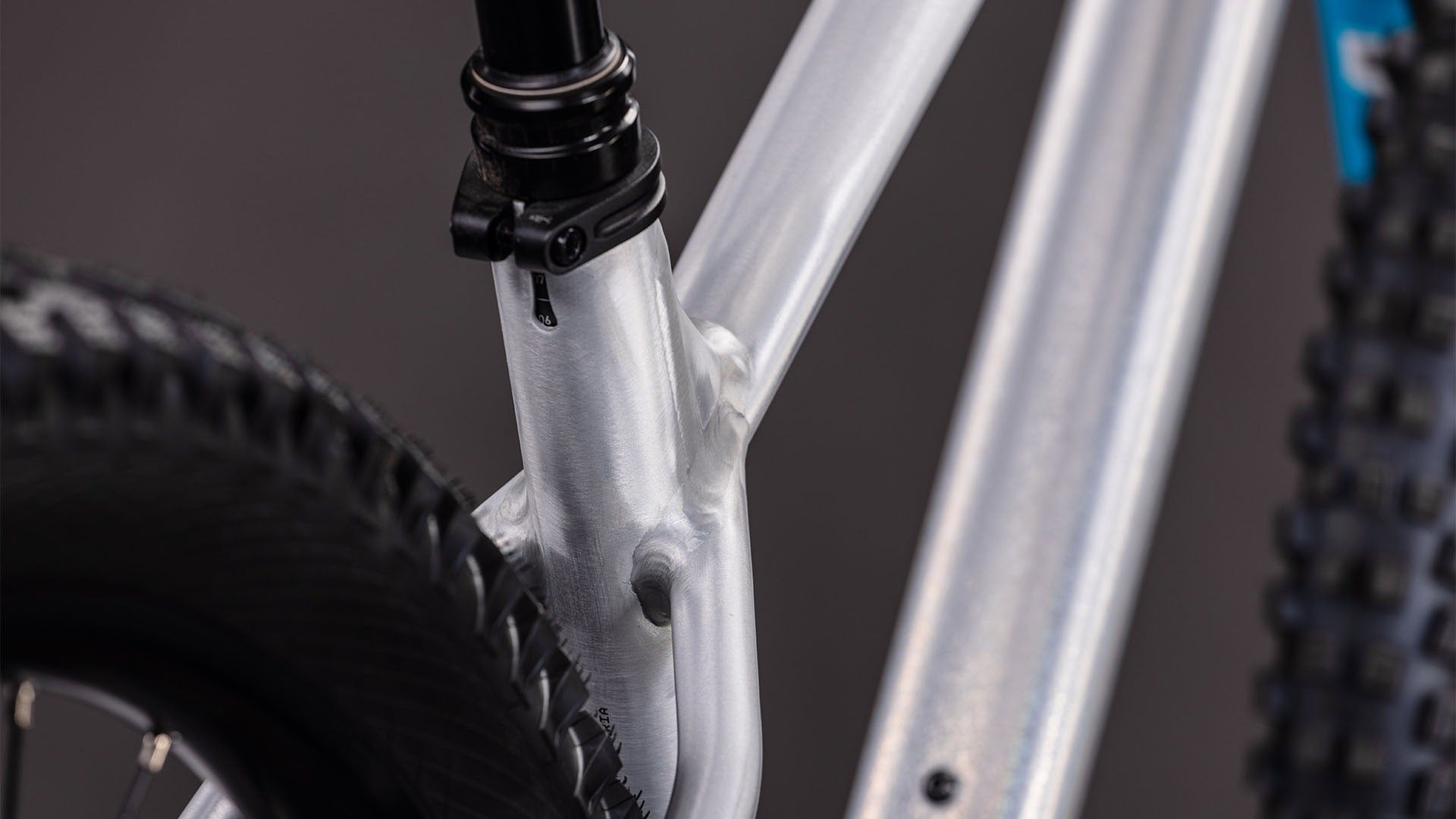 Close-up of a mountain bike frame with a blurred background