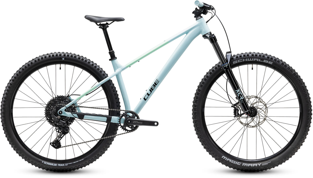 A pale blue Cube Mountain Bike on a white background