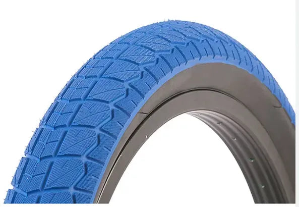 Blue BMX Tyre with tread pattern on a white background