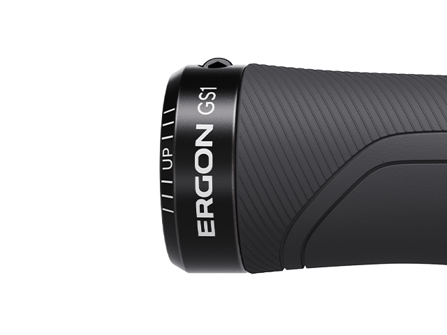 Close-up of a black Ergon GS1 bicycle handlebar grip on a white background