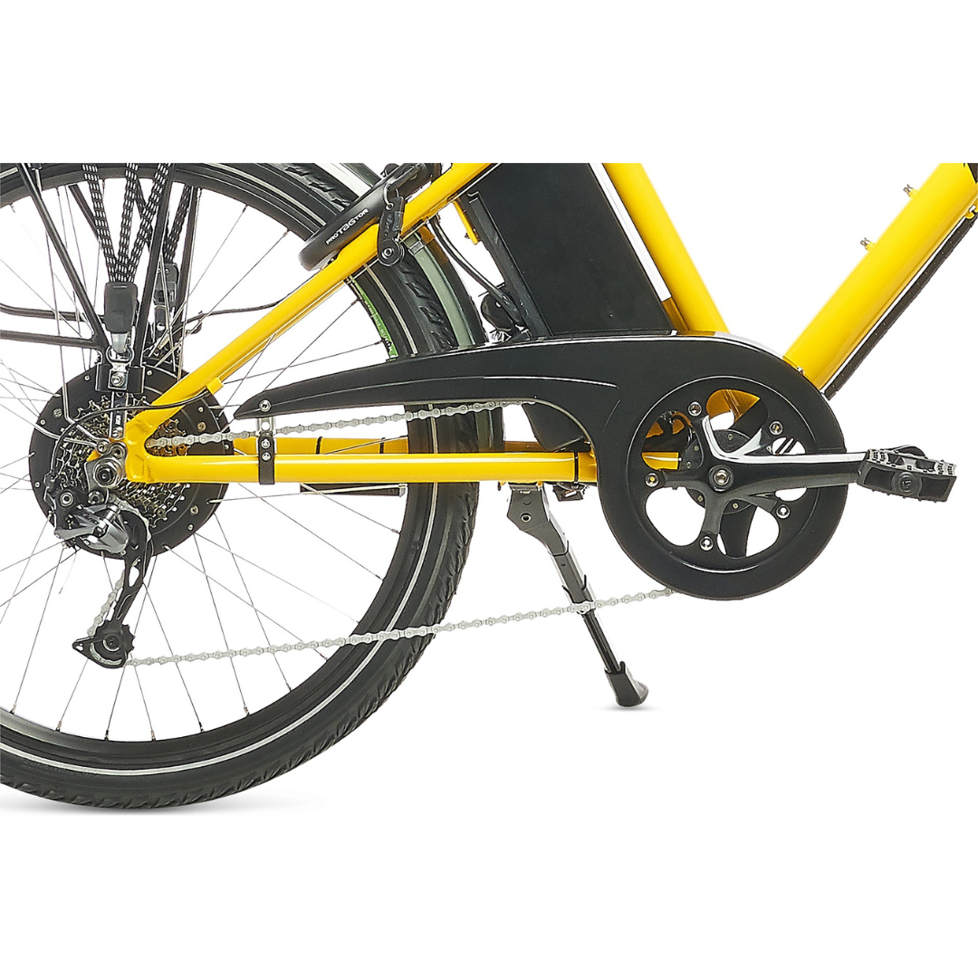Close-up of a yellow electric bicycle chain and gear system on a white background