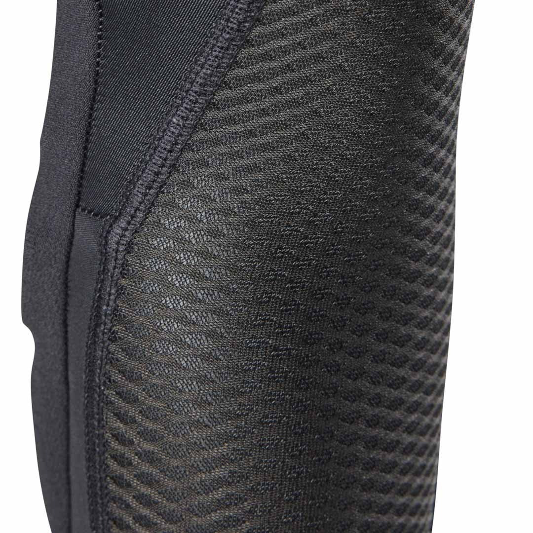 Close-up of a textured black elbow pad on a white background