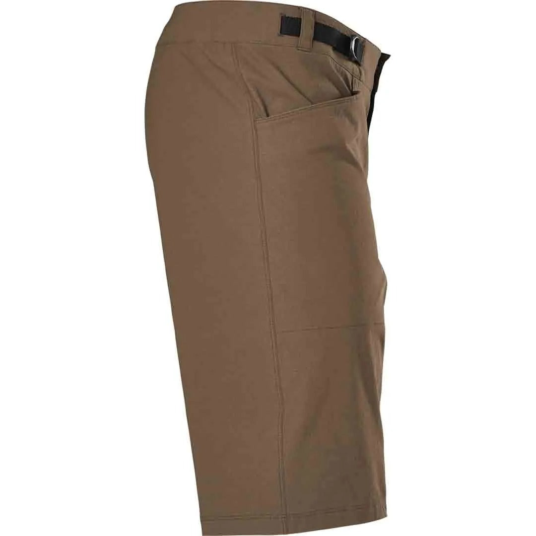 Tan mountain bike shorts on a white background