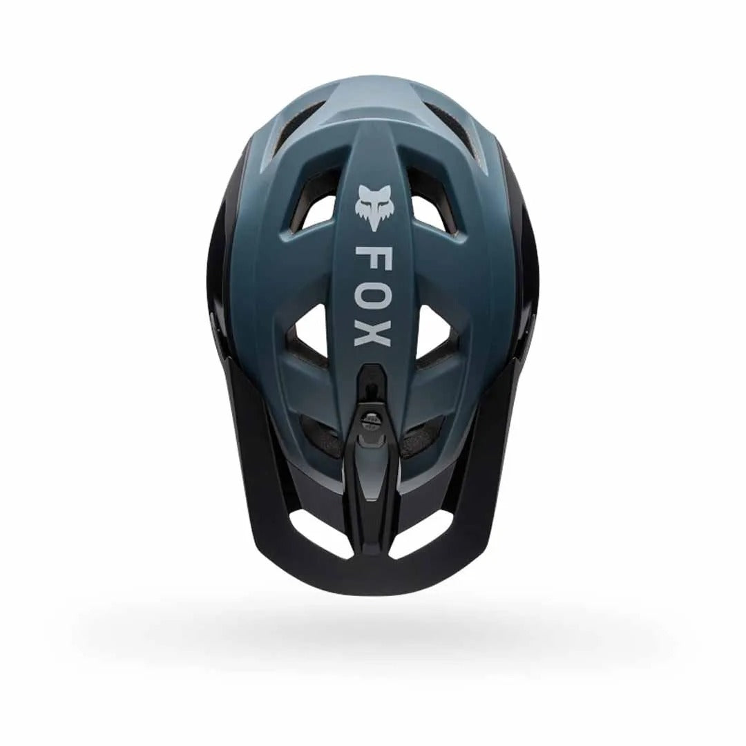 Birds eye view of a black and gray Fox helmet on a white background