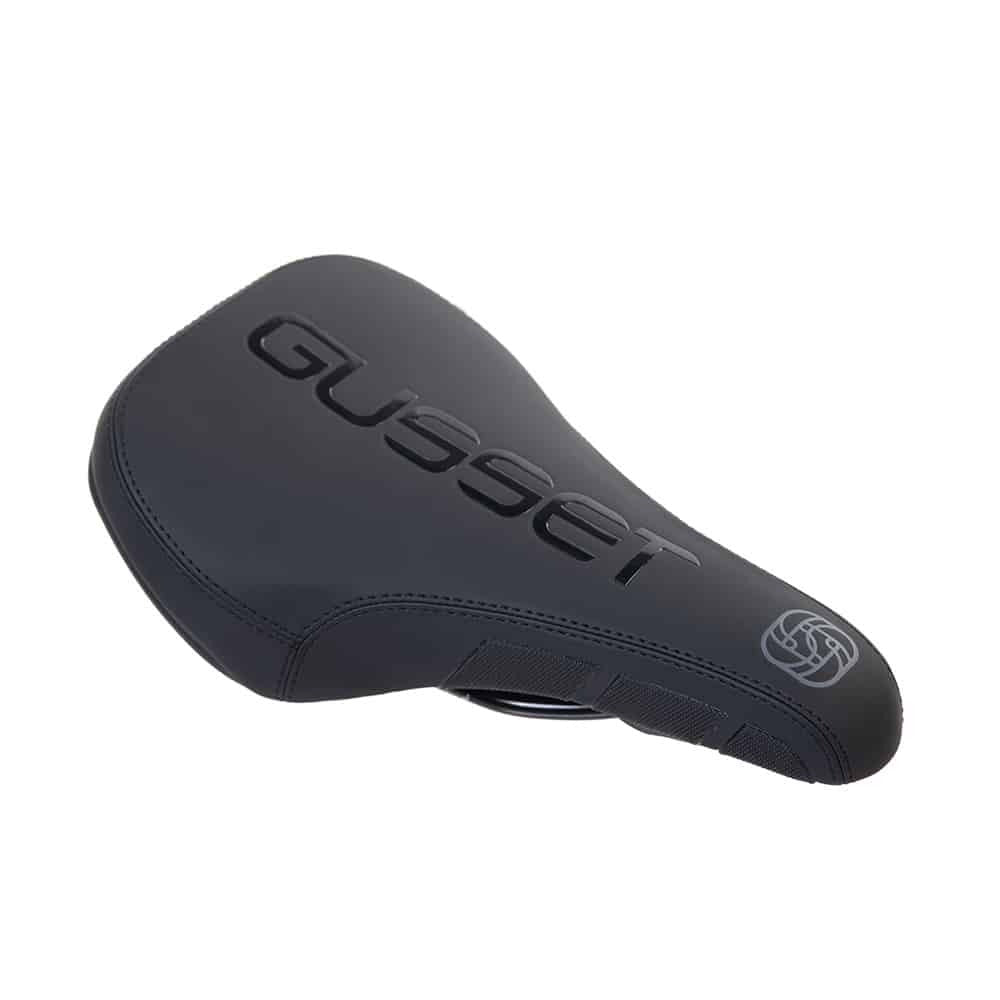 Black bicycle seat with 'Gusset' branding on a white background