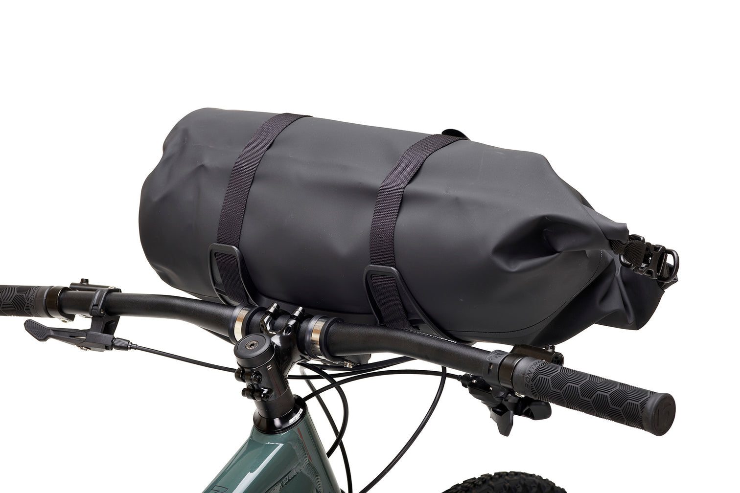 A picture of the Aeroe Spider Handlebar Cradle attached to bike with bag