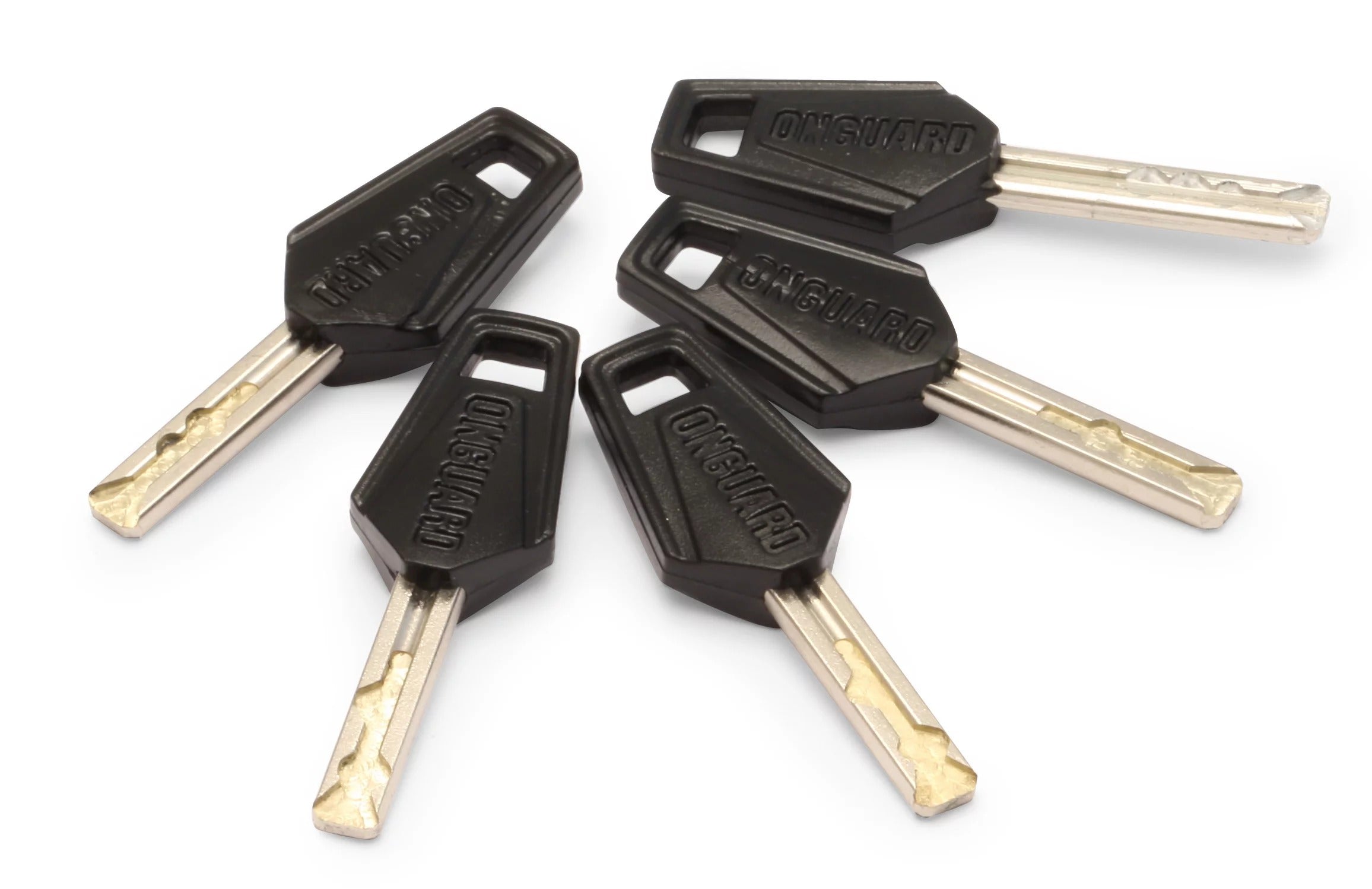 Set of Bicycle lock keys with black key heads and gold stems on a white background