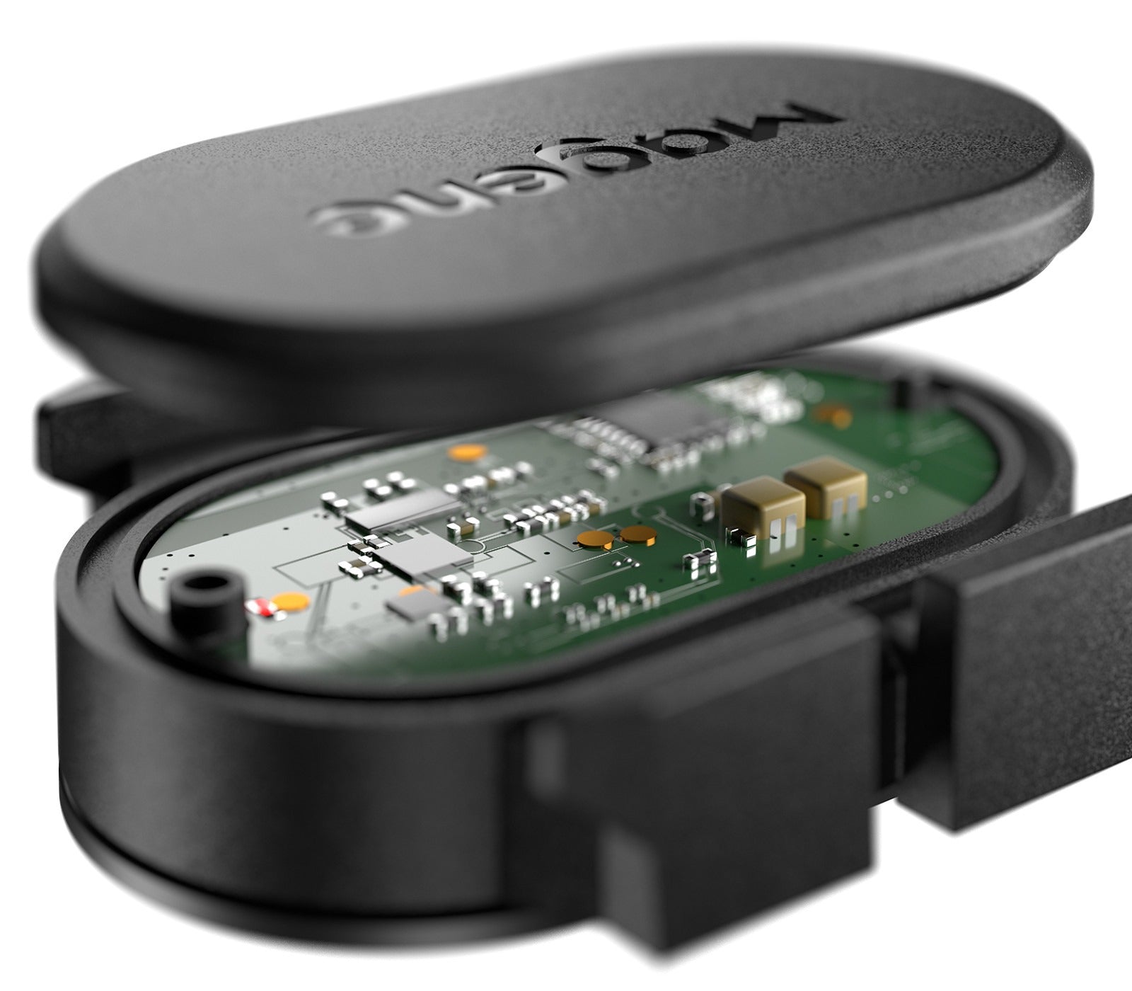 Close-up of a black bicycle speed sensor electronic device with visible circuitry on a white background 