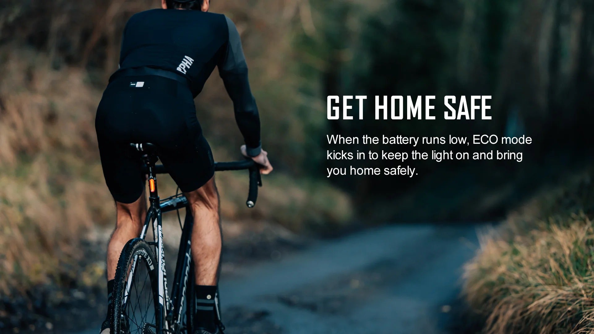 Gravel Cyclist on a trail with text 'Get Home Safe' and description of eco mode feature for a tail light.
