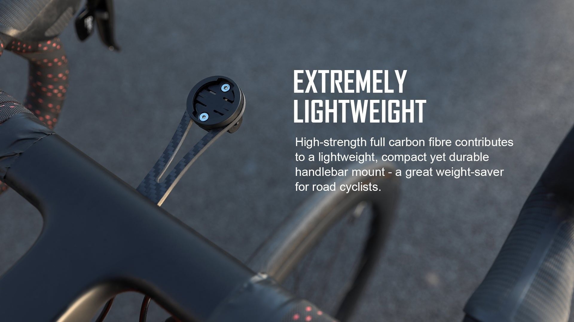 Outfront mount on road bike handlebar describing the lightweight features of the product with a blurred road surface in the background