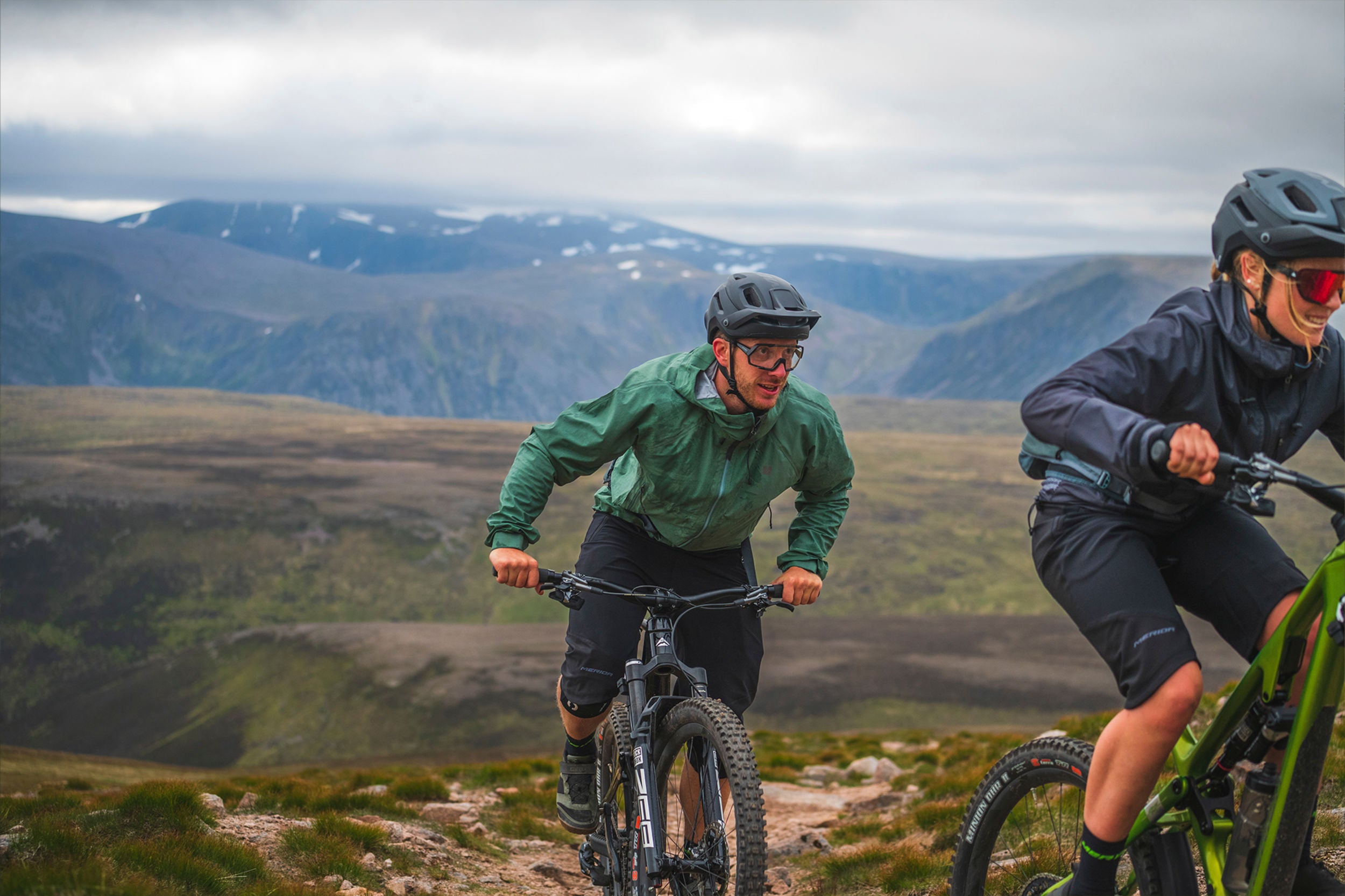 A picture of two people riding on Merida Mountain Bikes