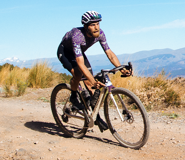 A picture of a man on a gravel bike with Pirelli gravel tyres on his bike