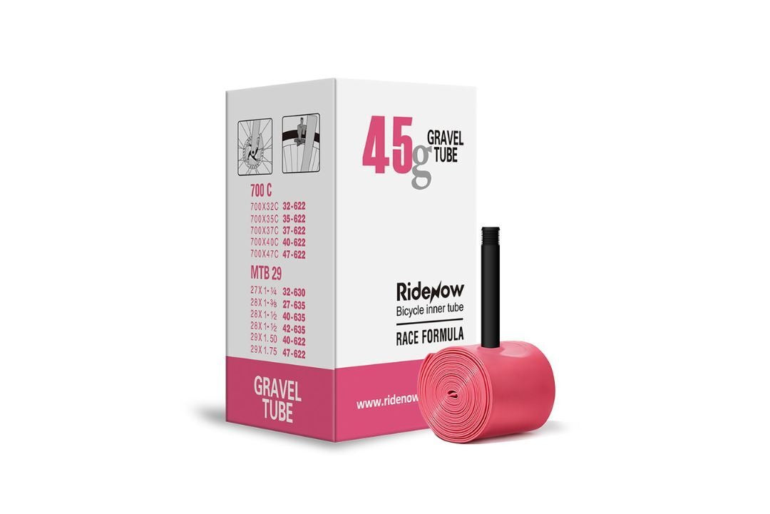 Pink gravel bicycle TPU inner tube with 'RideNow' branding and packaging on a white background