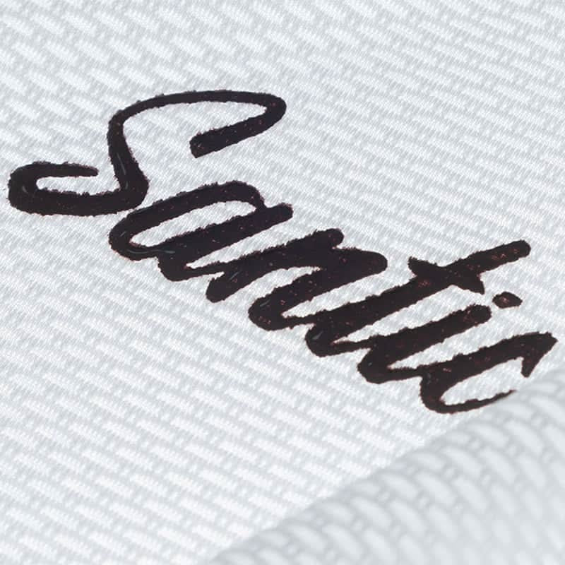 Santic Brand Name in black on white textured fabric