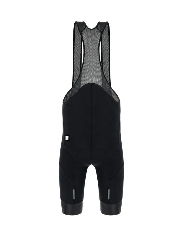 A pair of black bibshorts against a white background