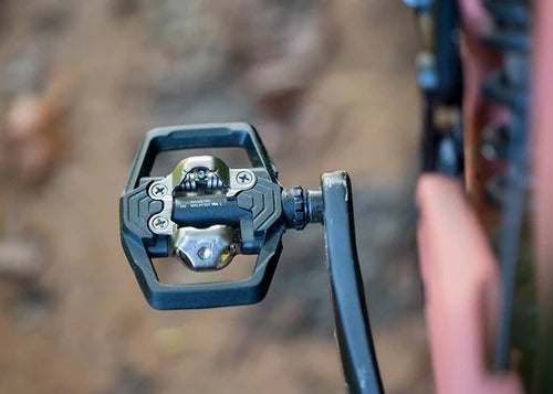 Close-up of a bicycle clip in pedal with a blurred natural background