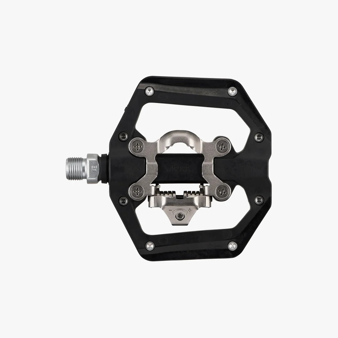 Black and silver bicycle pedal on a white background