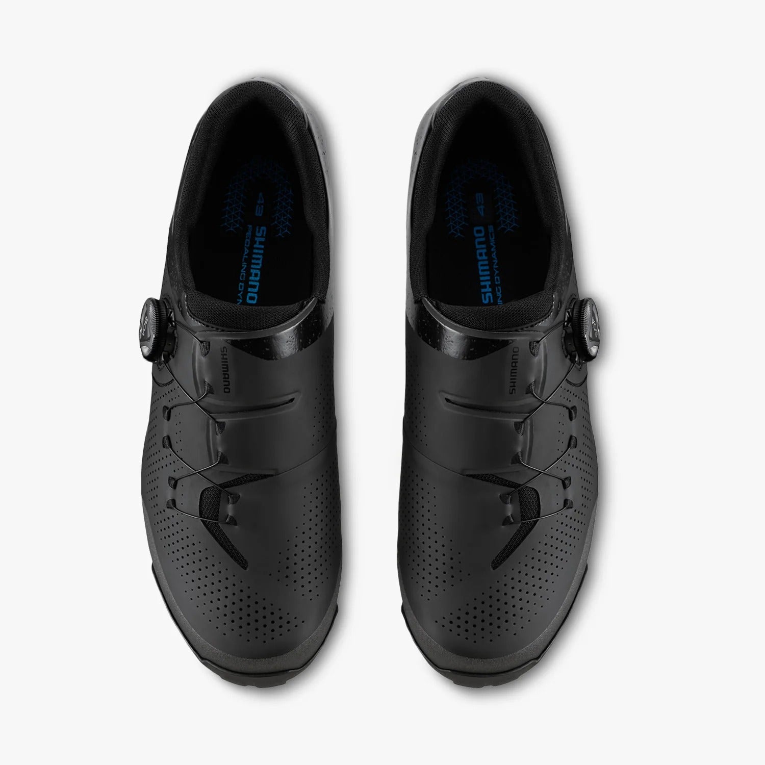 Pair of black Shimano cycling shoes on a white background