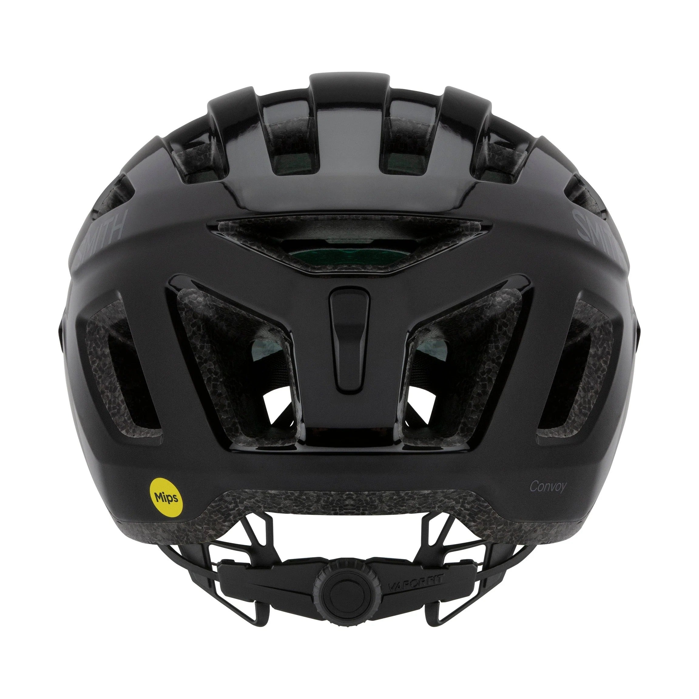 Showing the back of a black road bike helmet with yellow Mips sticker on a white background