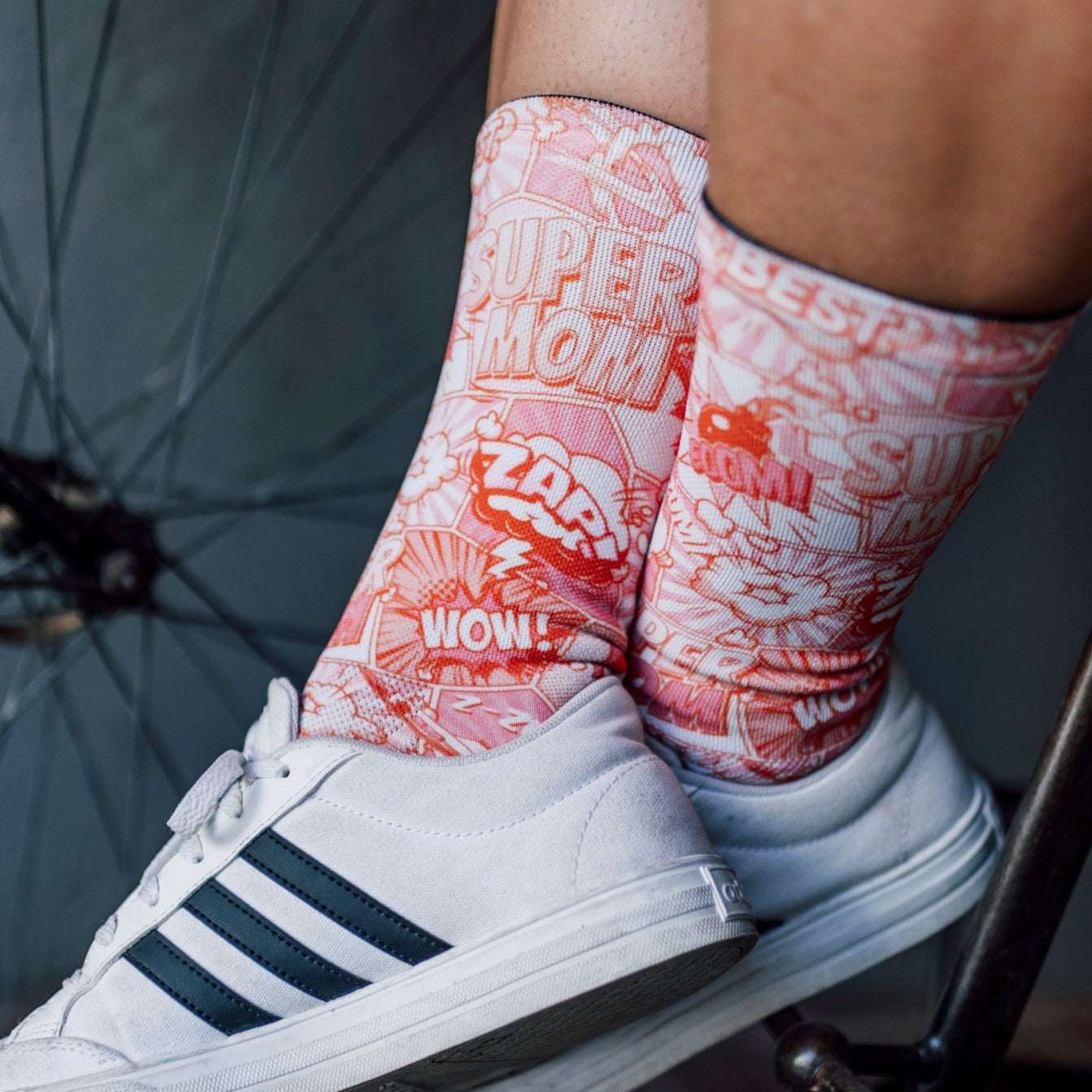 A picture of someone wearing the Sox Super Mom Cycling Socks with trainers on.